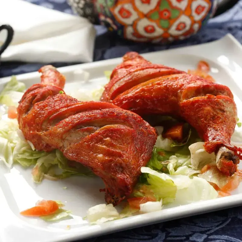 Tandoori chicken on salad